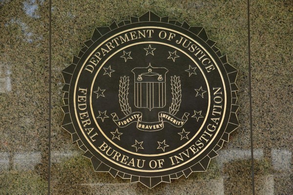 (FILES) This file photo taken on July 05, 2016 shows the FBI seal outside the headquarters building in Washington, DC.US President Donald Trump took the unusual step on february 24, 2017, of publicly criticizing the FBI, saying it was failing to stop national security leaks to the media, even from within the agency. The Republican's rebuke, posted on Twitter and Facebook, comes with his administration on the defensive against allegations of improper links to Russia, with several investigations into the matter underway on Capitol Hill and at the FBI. / AFP PHOTO / YURI GRIPAS