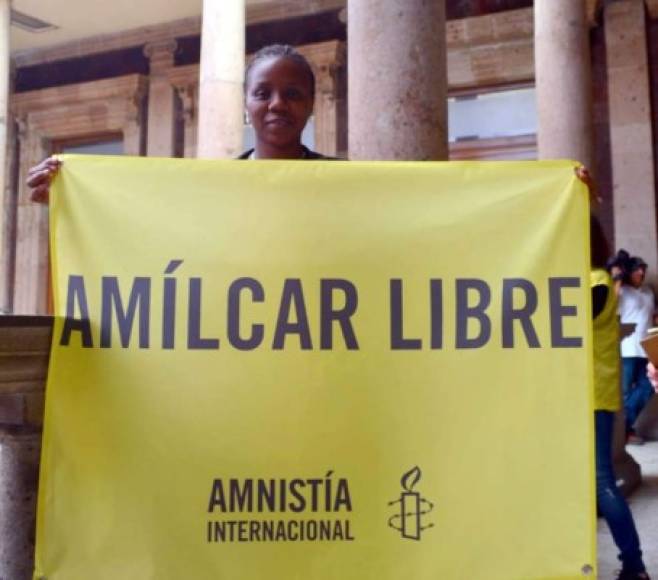 July Baltazar, esposa de Amílcar Colón, parte de la campaña de la Amnistía Internacional.