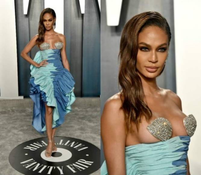 La modelo Joan Small dejó a más de uno boquiabierto con su elección de vestuario para la fiesta de Vanity Fair, cubriendo sus pechos con dos pequeñas conchas de mar.