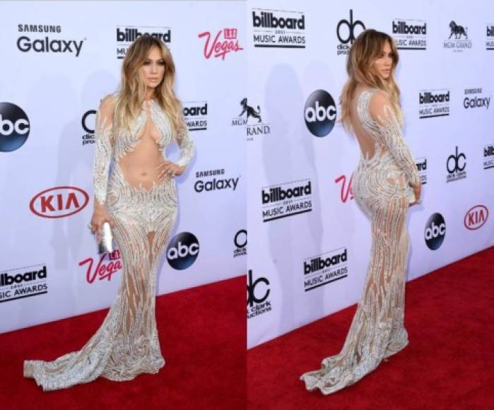 2015- Charbel Zoe<br/><br/>Siguiendo la tendencia en las transparencias, la diva apareció luciendo sus curvas en los Billboard Music Awards con un vestido transparente de Charbel Zoe.<br/><br/>