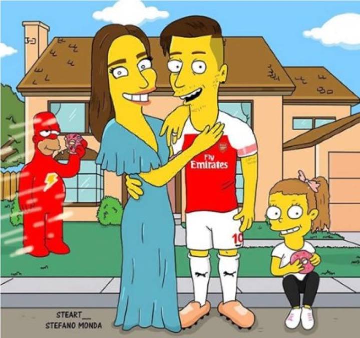 Mesut Özil, delantero alemán del Arsenal, y su pareja.