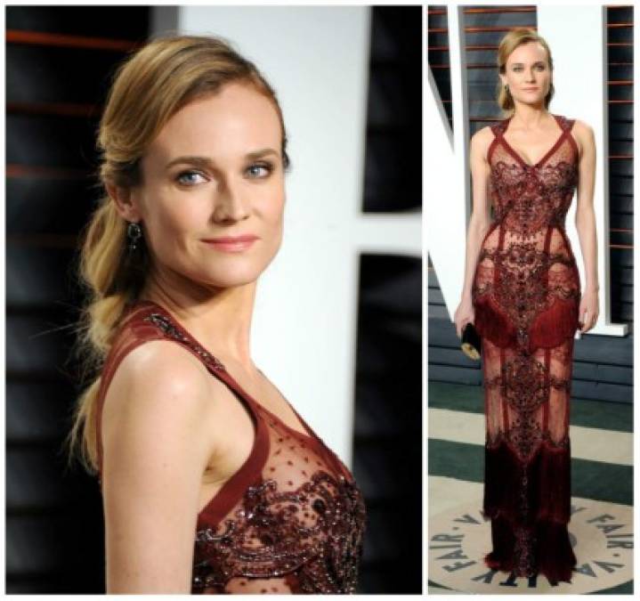 Diane Kruger reinventó el sexy con este vestido de encaje y transparencias en rojo vino de Reem Acra combinado con sandalias y clutch de Jimmy Choo y joyas de Sylva & Cie.