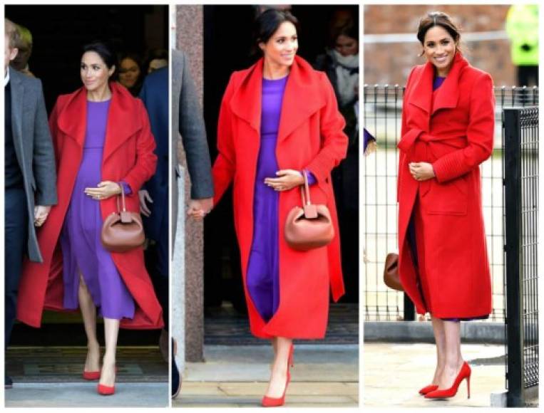 14 DE ENERO DE 2018<br/><br/>Meghan usó un vestido morado vibrante Babaton combinado con un abrigo rojo de Sentaler y tacones a juego de Stuart Weitzman para una visita a Birkenhead, Inglaterra, con el príncipe Harry.