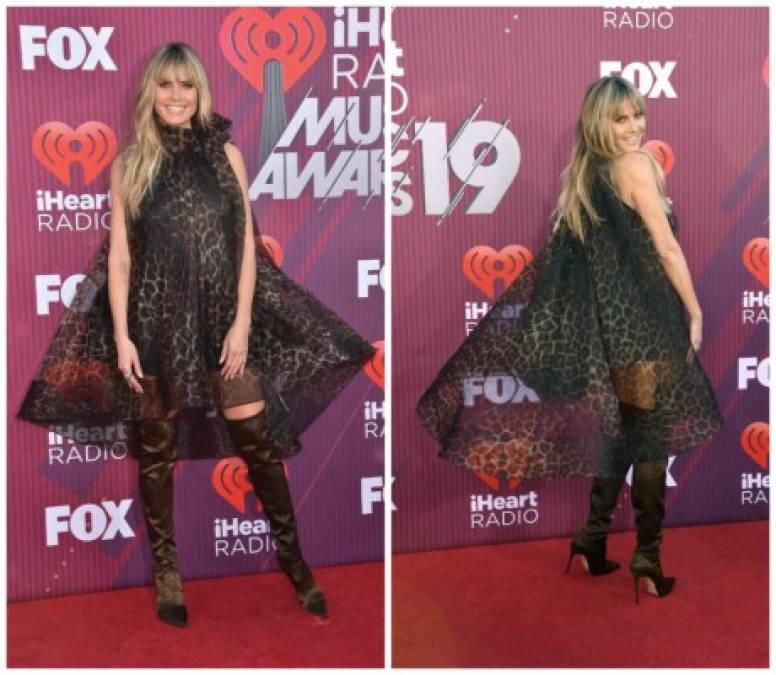 Heidi Klum optó por un traje con estampado animal que no le favorecía demasiado. Sus botas de satén también tenían el mismo patrón que su vestido.