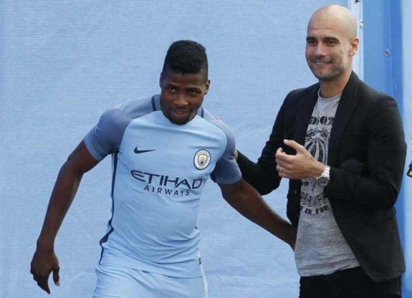 Britain Football Soccer - Pep Guardiola presented to Manchester City fans - City Academy Stadium - 3/7/16 Manchester City manager Pep Guardiola with Kelechi Iheanacho Action Images via Reuters / Craig Brough Livepic EDITORIAL USE ONLY.