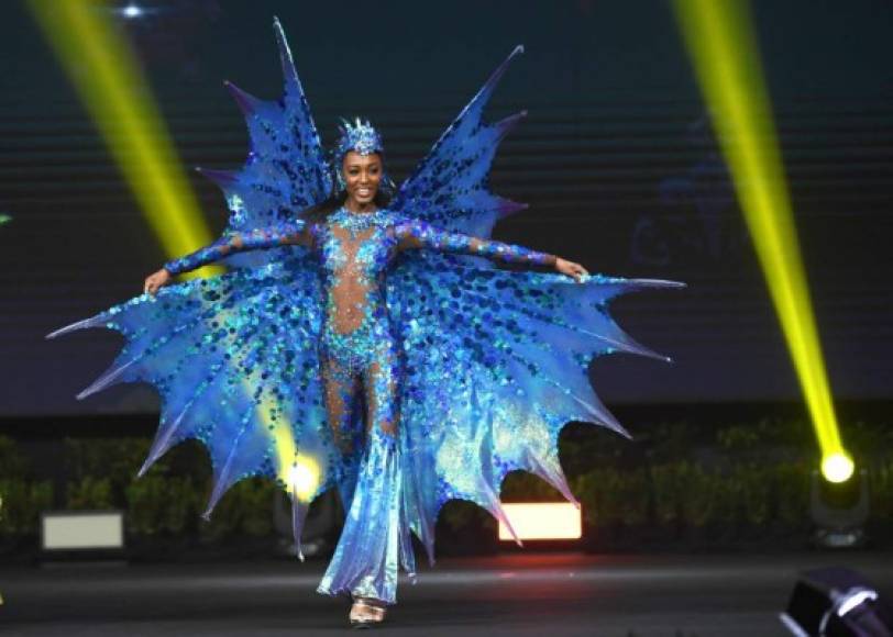 Meghan Theobalds, Miss Barbados 2018 walks on stage during the 2018 Miss Universe national costume presentation in Chonburi province on December 10, 2018. (Photo by Lillian SUWANRUMPHA / AFP)