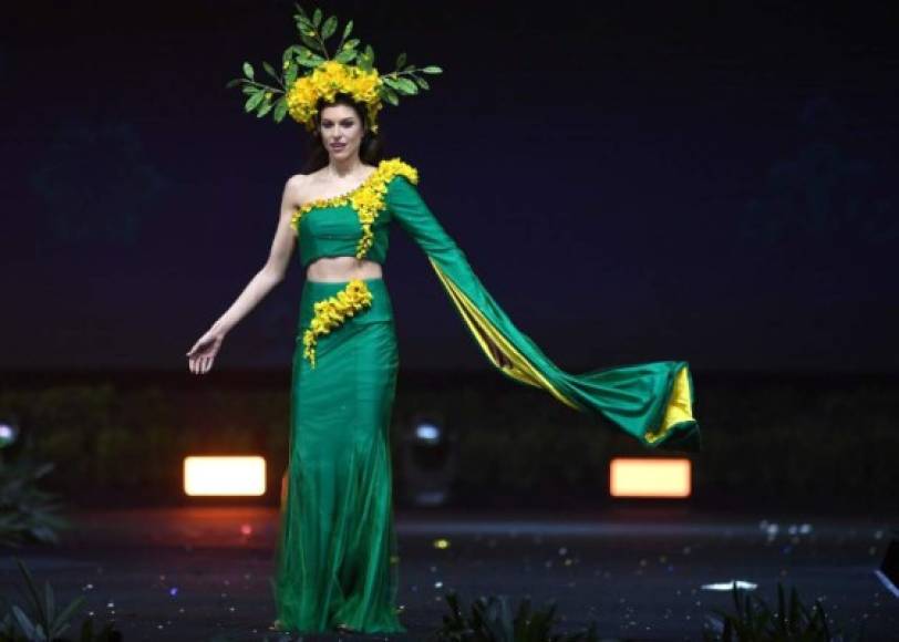 Estelle Curd, Miss New Zealand 2018 walks on stage during the 2018 Miss Universe national costume presentation in Chonburi province on December 10, 2018. (Photo by Lillian SUWANRUMPHA / AFP)