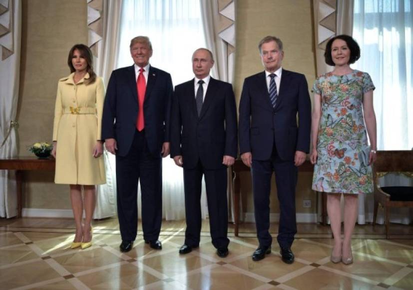 (L to R) US First Lady Melania Trump, US President Donald Trump, Russia's President Vladimir Putin, Finnish President Sauli Niinisto and his wife Jenni Haukio pose at the Presidential Palace in Helsinki, on July 16, 2018.<br/>The US and Russian leaders opened an historic summit in Helsinki, with Donald Trump promising an 'extraordinary relationship' and Vladimir Putin saying it was high time to thrash out disputes around the world.<br/> / AFP PHOTO / Sputnik / Aleksey Nikolskyi