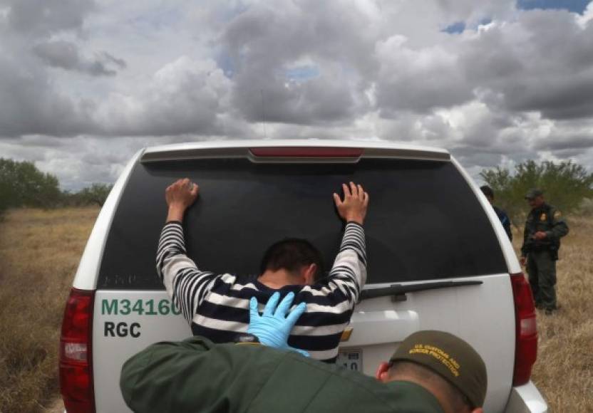 ROMA, TX - AUGUST 16: Detained immigrants are searched after being captured by U.S. Border Patrol agents on August 16, 2016 in Roma, Texas. Border security has become a main issue in the U.S. Presidential campaign, as Republican Presidential candidate Donald Trump has promised to build a wall, at Mexico's expense to fortify the U.S.-Mexico border. John Moore/Getty Images/AFP<br/><br/>== FOR NEWSPAPERS, INTERNET, TELCOS & TELEVISION USE ONLY ==<br/><br/>