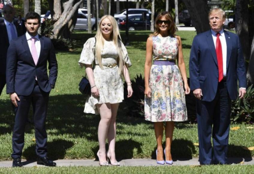 US President Donald Trump, First Lady Melania Trump, his daughter Tiffany Trump (2L), and Tiffany's boyfriend Michael Boulos (L) arrive at the Bethesda-by-the-Sea church for Easter services in Palm Beach, Florida on April 21, 2019. (Photo by Nicholas Kamm / AFP) / The erroneous mention[s] appearing in the metadata of this photo by Nicholas Kamm has been modified in AFP systems in the following manner: [Bethesda-by-the-Sea] instead of [Bethesda-on-the-Sea]. Please immediately remove the erroneous mention[s] from all your online services and delete it (them) from your servers. If you have been authorized by AFP to distribute it (them) to third parties, please ensure that the same actions are carried out by them. Failure to promptly comply with these instructions will entail liability on your part for any continued or post notification usage. Therefore we thank you very much for all your attention and prompt action. We are sorry for the inconvenience this notification may cause and remain at your disposal for any further information you may require.