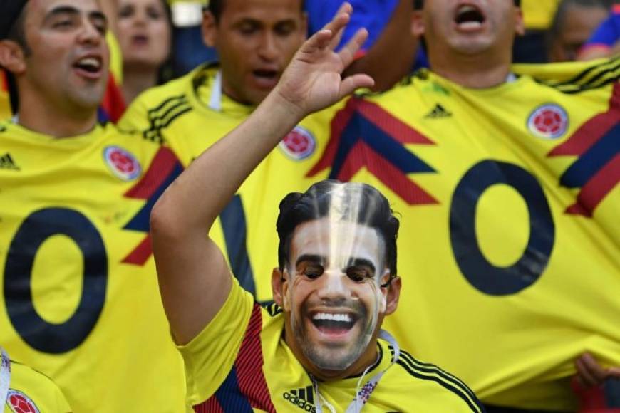 Un aficionado de Colombia con una máscara de Falcao. Foto AFP