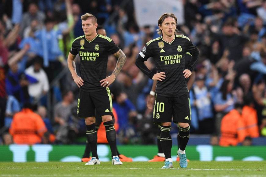 Luka Modric y Toni Kroos, tristes por los primeros goles del Manchester City.