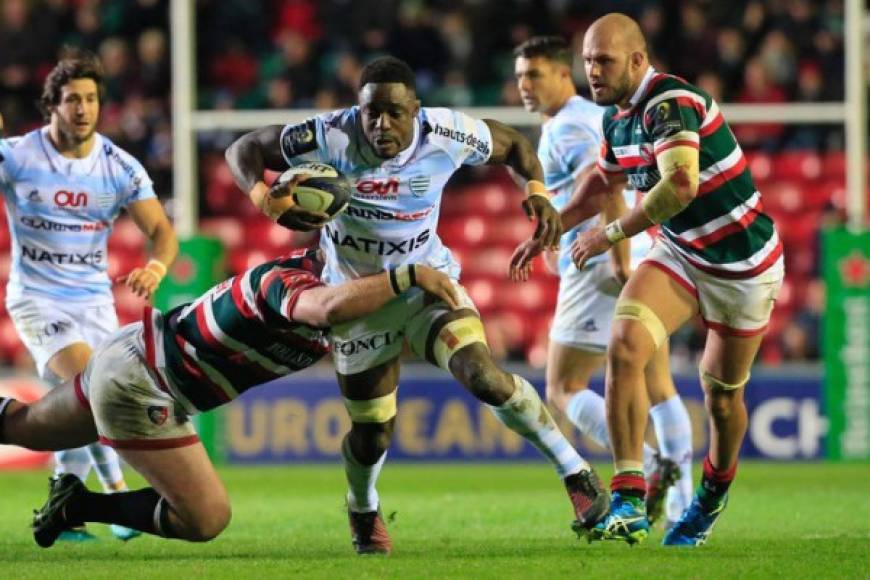 RUGBY. Tacleada al estilo británico. El francés Yannick Nyanga es abordado durante el partido de la primera fase del European Champions Cup rugby entre Leicester Tigers y Racing 92, donde los primeros fueron los locales del juego temerario.