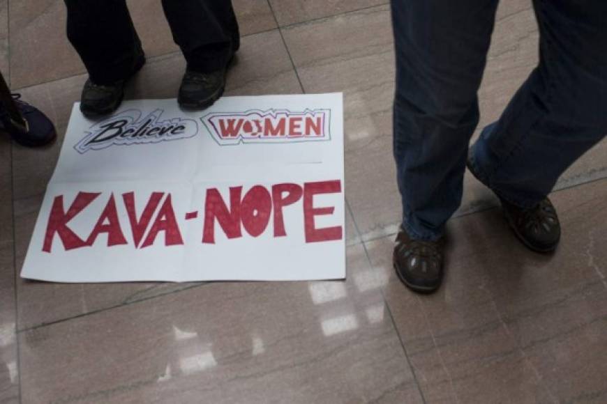 WASHINGTON, DC - SEPTEMBER 27: A sign lays on the floor during a protest against Supreme Court Nominee Brett Kavanaugh on September 27, 2018 in Washington, DC. On Thursday, Christine Blasey Ford, who has accused Kavanaugh of sexual assault, is testifying before the Senate Judiciary Committee. Zach Gibson/Getty Images/AFP