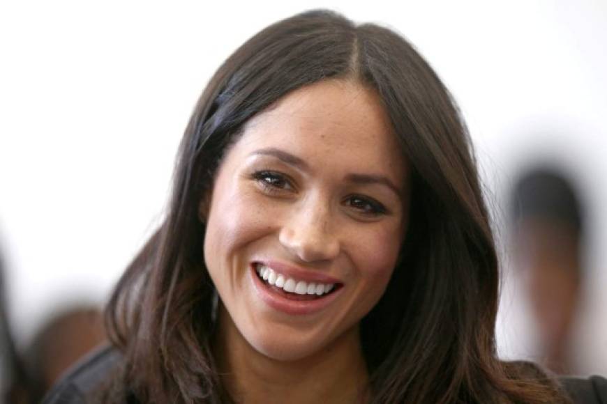 US actress and fiancee of Britain's Prince Harry Meghan Markle attensd a reception with delegates from the Commonwealth Youth Forum in central London on April 18, 2017, on the sidelines of the Commonwealth Heads of Government meeting (CHOGM). / AFP PHOTO / POOL / Yui Mok