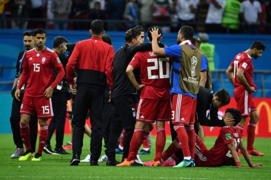 Los jugadores de Irán tristes por la derrota ante España. Foto AFP