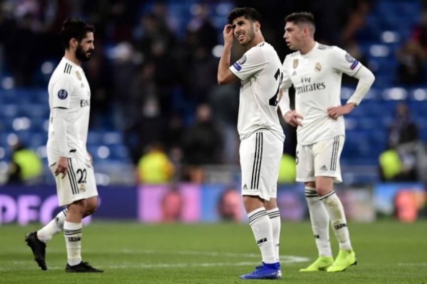 La tristeza de Isco, Marco Asensio y Javi Sánchez al final del partido.