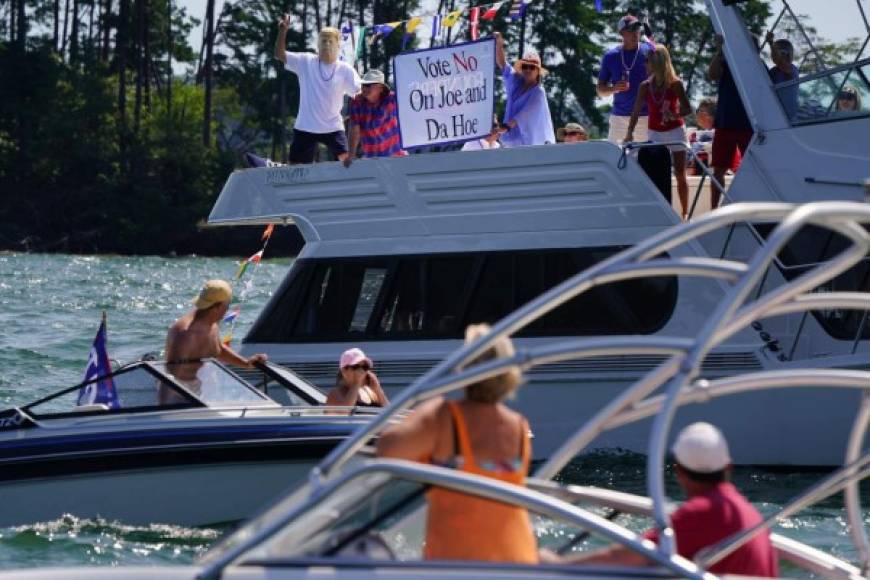 CUMMING, GA - SEPTEMBER 06: Boats adorned with U.S. and President Donald Trump campaign flags are seen on Lake Lanier during a 'Great American Boat Parade' on September 6, 2020 in Cumming, Georgia. A similar event held on Lake Travis, northwest of Austin, Texas yesterday resulted in distress calls and the sinking of multiple boats, though no injuries were reported. Elijah Nouvelage/Getty Images/AFP<br/><br/>== FOR NEWSPAPERS, INTERNET, TELCOS & TELEVISION USE ONLY ==<br/><br/>