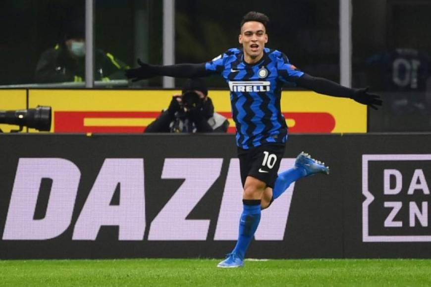 Inter Milan's Argentine forward Lautaro Martinez celebrates after scoring during the Italian Serie A football match Inter Milan vs Lazio Rome on February 14, 2021 at the San Siro stadium in Milan. (Photo by Marco BERTORELLO / AFP)