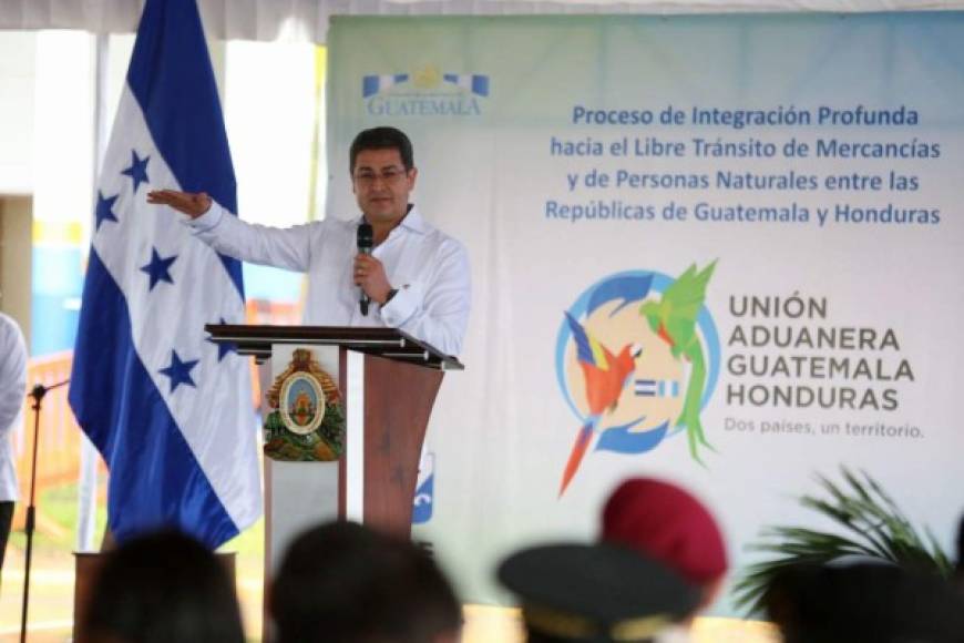 This handout picture released by Honduras' Presidency shows Honduras' President Juan Orlando Hernandez delivering a speech during the official launch of the binational customs process union in Corinto, Cortes department, Honduras, on June 26, 2017.<br/>Guatemala and Honduras are officially opening their borders for free circulation of goods, being the first Central American countries to accomplish the pursued aim of a customs union. / AFP PHOTO / Honduras' Presidency / HO / RESTRICTED TO EDITORIAL USE - MANDATORY CREDIT 'AFP PHOTO /Honduras' Presidency /HO ' - NO MARKETING - NO ADVERTISING CAMPAIGNS - DISTRIBUTED AS A SERVICE TO CLIENTS<br/><br/>
