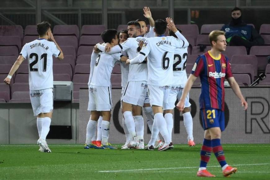 Jugadores del Getafe festejando el autogol de Lenglet para el empate 1-1.