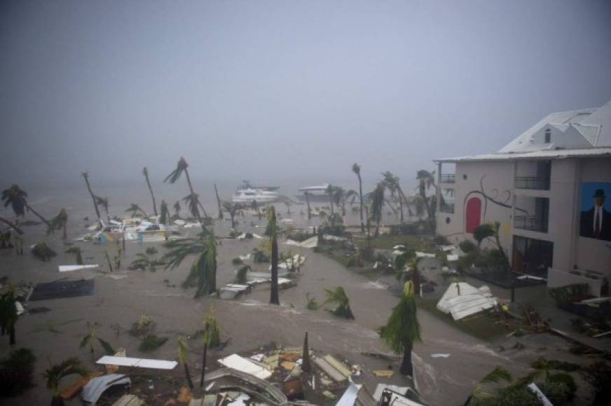 A photo taken on September 6, 2017 shows the Hotel Mercure in Marigot, near the Bay of Nettle, on the French Collectivity of Saint Martin, during the passage of Hurricane Irma.<br/>France, the Netherlands and Britain on September 7 sent water, emergency rations and rescue teams to their stricken territories in the Caribbean hit by Hurricane Irma, which has killed at least 10 people. The worst-affected island so far is Saint Martin, which is divided between the Netherlands and France, where eight of the 10 confirmed deaths took place.<br/> / AFP PHOTO / Lionel CHAMOISEAU