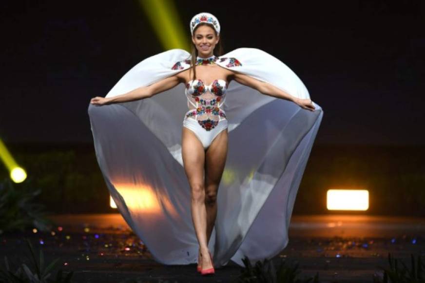 Eniko Kecskes, Miss Hungary 2018 walks on stage during the 2018 Miss Universe national costume presentation in Chonburi province on December 10, 2018. (Photo by Lillian SUWANRUMPHA / AFP)