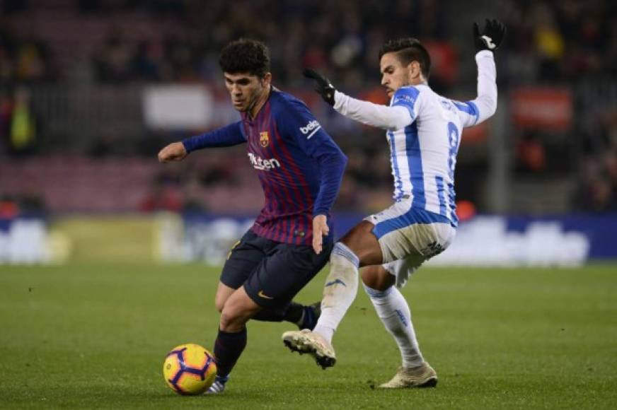 Los jugadores del FC Barcelona celebran el gol marcado por Ansu Fati (2-d) ante el Leganés, durante el partido de Liga en Primera División que disputaron en el Camp Nou, en Barcelona. EFE/Alberto Estévez<br/>