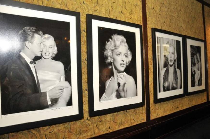 12th September 1954: A portrait of Marilyn Monroe (1926 - 1962) sitting with her husband Joe DiMaggio (1914 - 1999) at El Morocco, New York City, New York. (Photo by Hulton Archive/Getty Images)