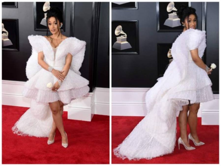 La rapera Cardi B usó un vestido esponjado blanco que combinó con un maquillaje sencillo y zapatillas del mismo tono.<br/>