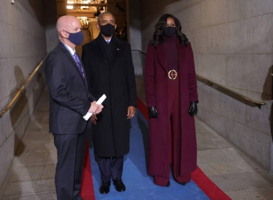 WASHINGTON, DC - JANUARY 20: Former U.S. President Barack Obama and Michelle Obama at the inauguration of U.S. President-elect Joe Biden on the West Front of the U.S. Capitol on January 20, 2021 in Washington, DC. During today's inauguration ceremony Joe Biden becomes the 46th president of the United States. Win McNamee/Getty Images/AFP