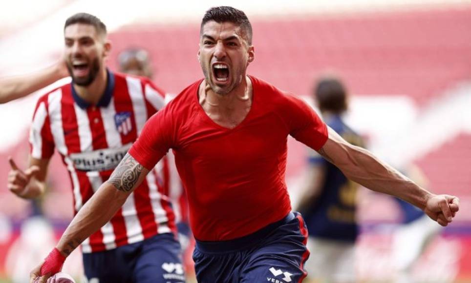 La brutal imagen de Luis Suárez gritando eufórico su gol que dio la victoria al Atlético y que puede valer el título de la Liga Española.