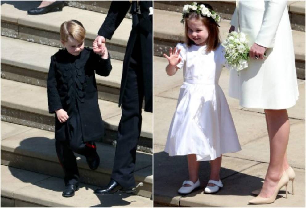 Princess Charlotte of Cambridge (L) stands on the steps holding the hand of her mother Britain's Catherine, Duchess of Cambridge, (R) after attending the wedding ceremony of Britain's Prince Harry, Duke of Sussex and US actress Meghan Markle at St George's Chapel, Windsor Castle, in Windsor, on May 19, 2018. / AFP PHOTO / POOL / Jane Barlow