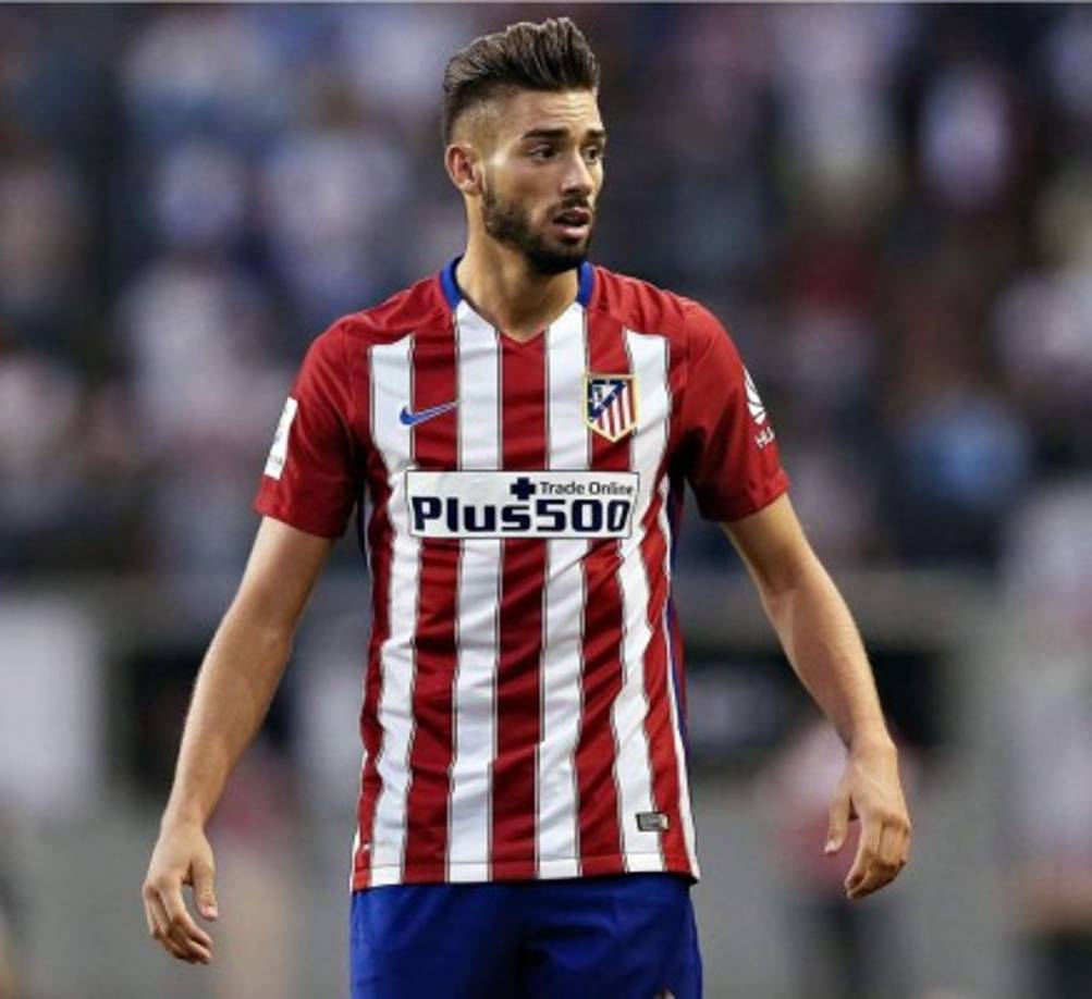 Atletico Madrid's Belgian midfielder Yannick Ferreira Carrasco celebrates a goal during the Spanish league football match Club Atletico de Madrid vs Valencia CF at the Vicente Calderon stadium in Madrid on October 25, 2015. AFP PHOTO/ GERARD JULIEN (Photo credit should read GERARD JULIEN/AFP/Getty Images)