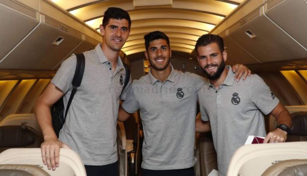 Thibaut Courtois, Marco Asensio y Nacho Fernández llegaron sonrientes a Estados Unidos.