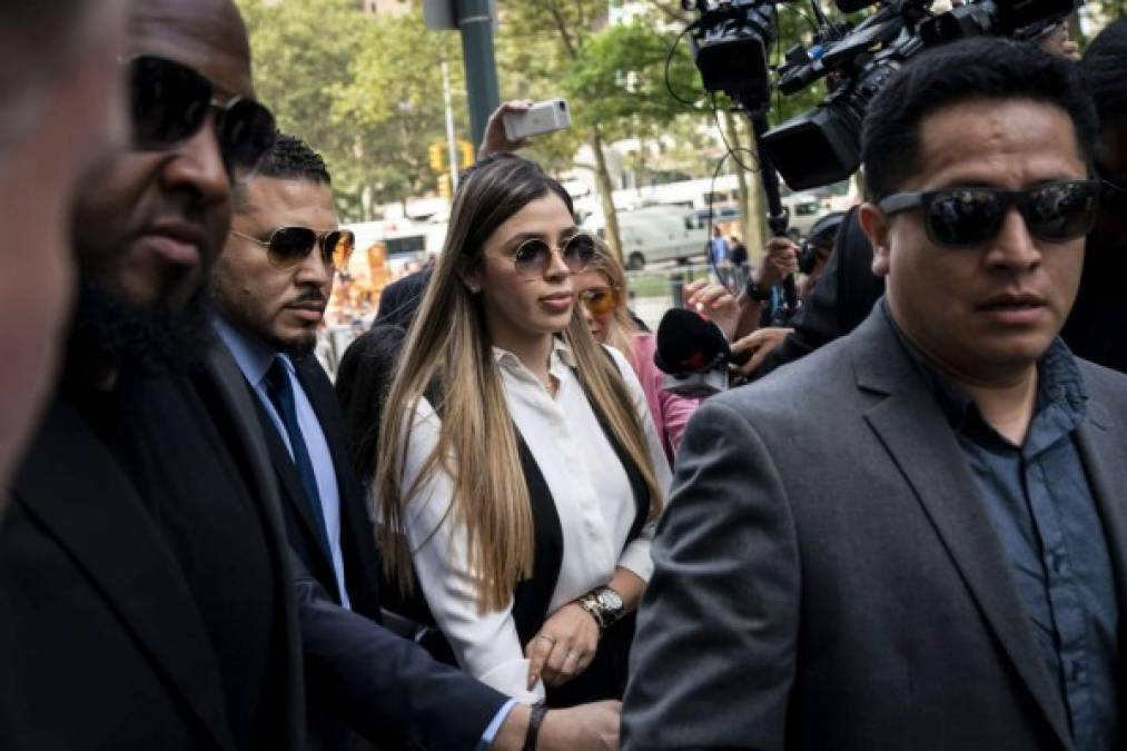 NEW YORK, NY - JULY 17: Emma Coronel Aispuro, wife of Joaquin 'El Chapo' Guzman, is surrounded by security as she arrives at federal court on July 17, 2019 in New York City. El Chapo was found guilty on all charges in a drug conspiracy trial and will be sentenced this morning. Drew Angerer/Getty Images/AFP<br/><br/>== FOR NEWSPAPERS, INTERNET, TELCOS & TELEVISION USE ONLY ==<br/><br/>