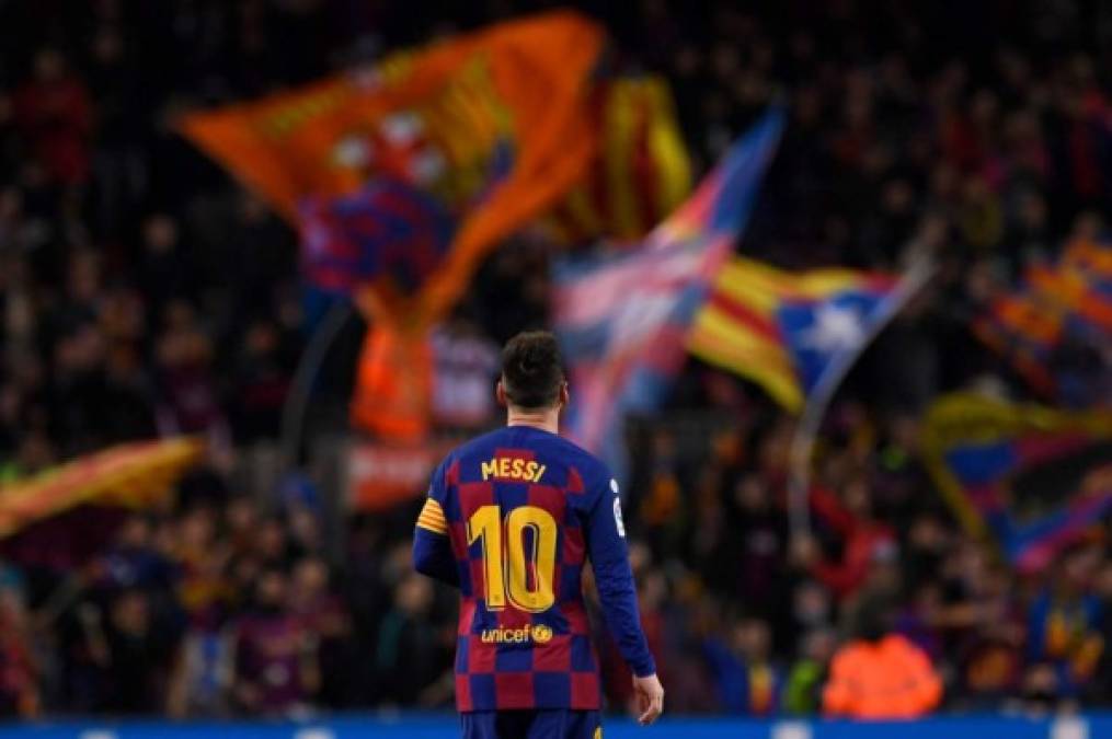 (FILES) In this file photo taken on November 09, 2019 Barcelona's Argentine forward Lionel Messi celebrates after scoring during the Spanish league football match between FC Barcelona and RC Celta de Vigo at the Camp Nou stadium in Barcelona. - Plan A was to stay at Barcelona but after the Catalan club, home for his entire career, ruefully accepted it cannot afford him any more, Lionel Messi was expected to be about to embark on plan P for Paris on August 7, 2021. French fans and media alike were salivating on the effect the superstar's mooted arrival at Paris Saint-Germain would have on the club and the French league as a whole amid reports the Argentinian will end up in the capital. (Photo by Josep LAGO / AFP)