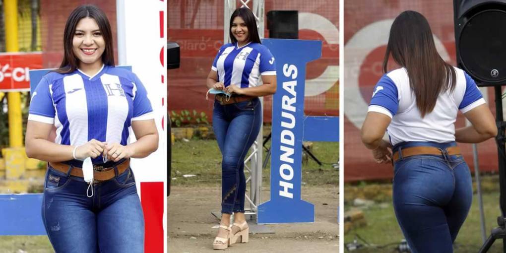 Esta guapa aficionada hondureña deslumbra en el estadio Olímpico.