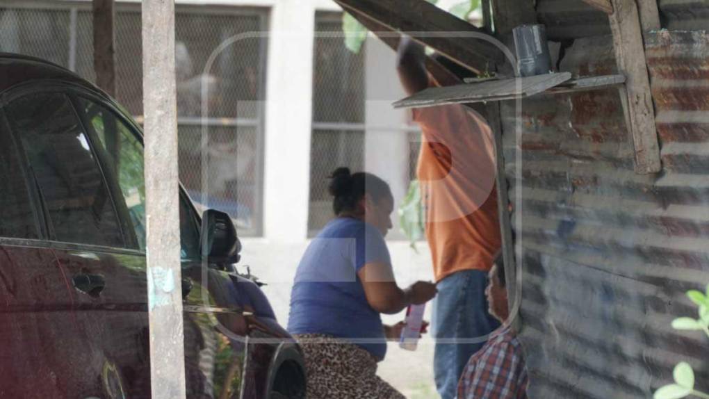 Sicarios con chalecos antibalas en una camioneta mataron a dos hombres en taller de San Pedro Sula