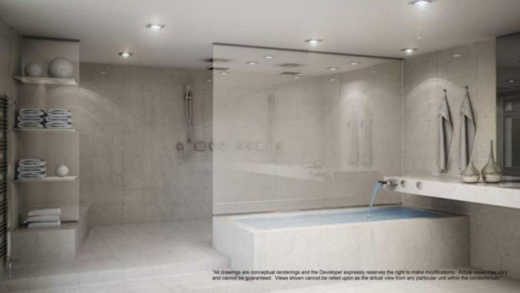 Los baños disponen de duña y bañera y muebles de un diseño depurado fabricados en mármol y con originales grifos.