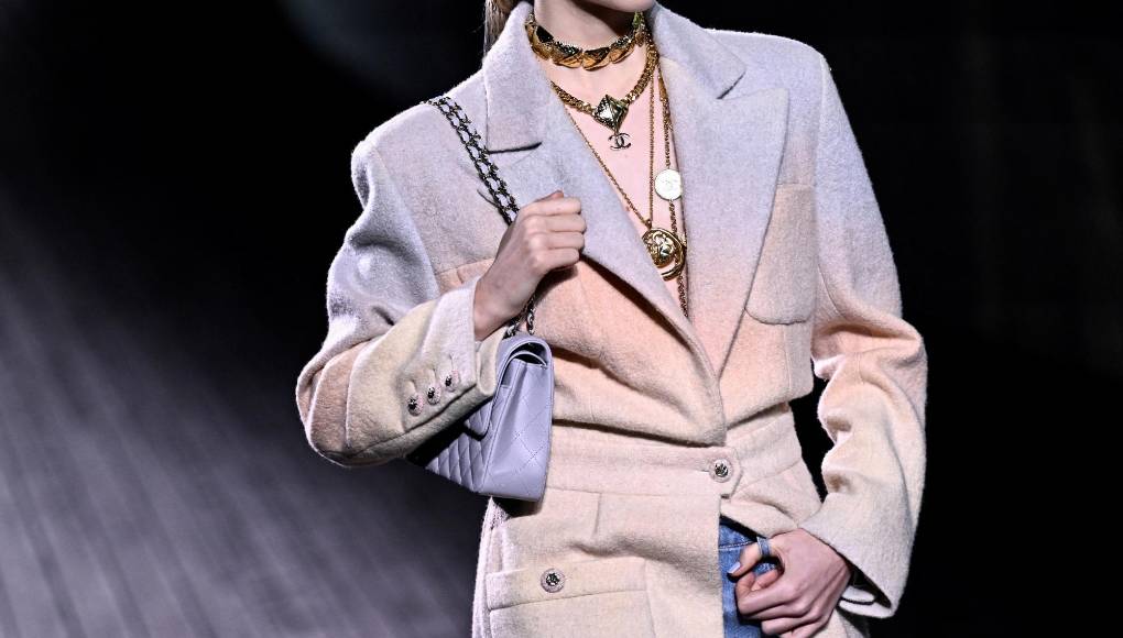 A model presents a creation by Chanel for the Women Ready-to-wear Fall-Winter 2024/2025 collection as part of the Paris Fashion Week, in Paris on March 5, 2024. (Photo by JULIEN DE ROSA / AFP)