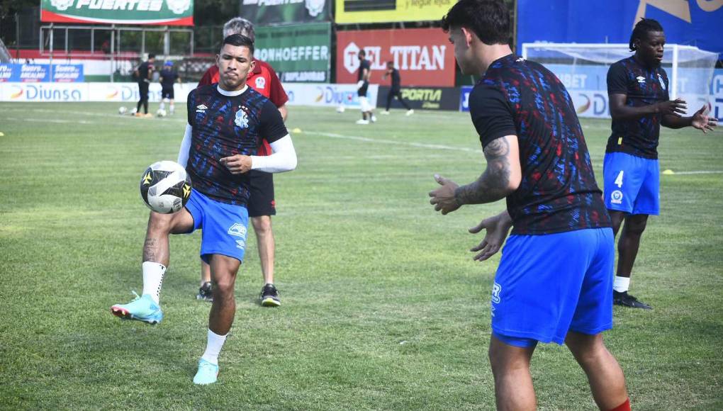 Calentamiento del plantel de Olimpia.