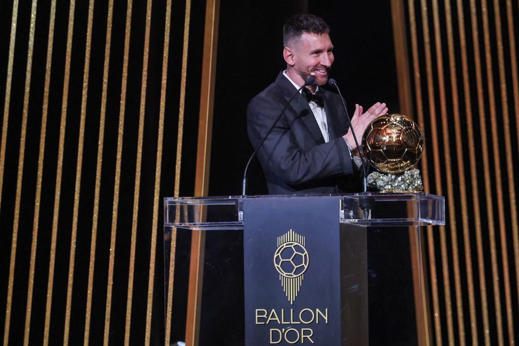 Inter Miami CF's Argentine forward Lionel Messi gestures on stage as he receives his 8th Ballon d'Or award during the 2023 Ballon d'Or France Football award ceremony at the Theatre du Chatelet in Paris on October 30, 2023. (Photo by FRANCK FIFE / AFP)