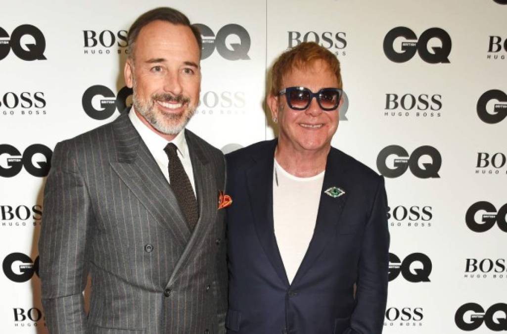 Elton John (68) y David Furnish (52).