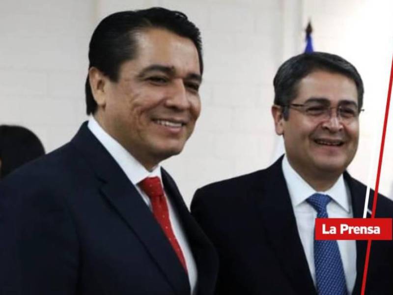 Pastor Roy Santos y Juan Orlando Hernández en una fotografía de archivo.