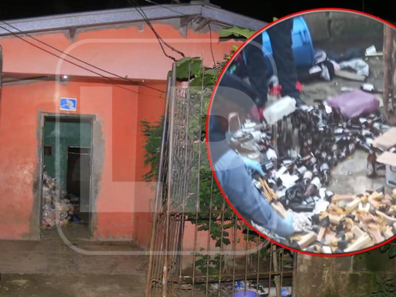 La agentes de la DPI recaban información en la vivienda allanada.