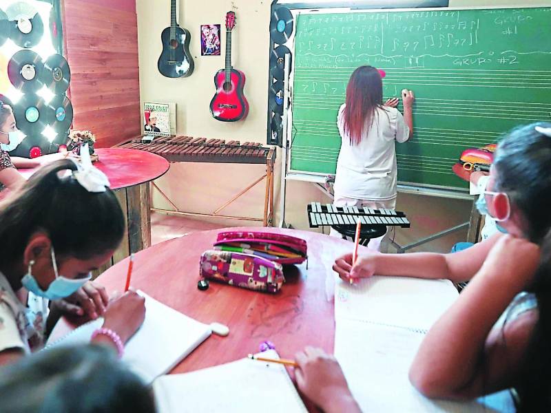 Recaudan fondos para construir escuela de música para los niños de Chamelecón