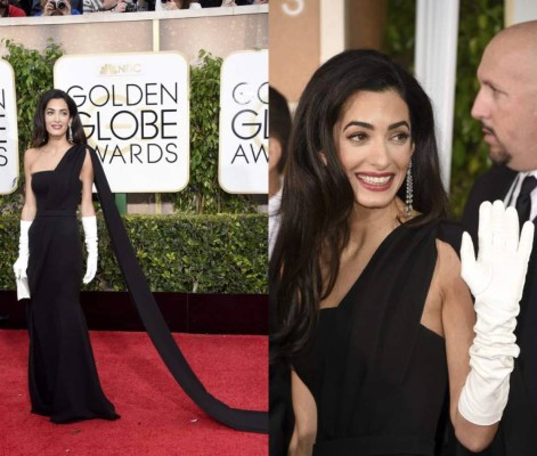 La mujer de George Clooney se estrenaba en la alfombra roja para y no defraudó para algunos aunque otros no estaban satisfechos con su look. Los guantes blancos de la abogada Amal Alamuddin fueron de lo más comentado de la noche.