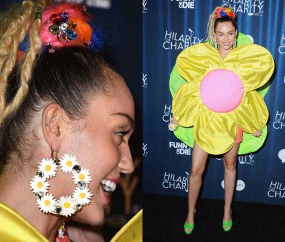 Previamente, la cada día más extravagante 'celebrity' llegó al programa vestida de flor, con un vestido rosa y tacones verdes.