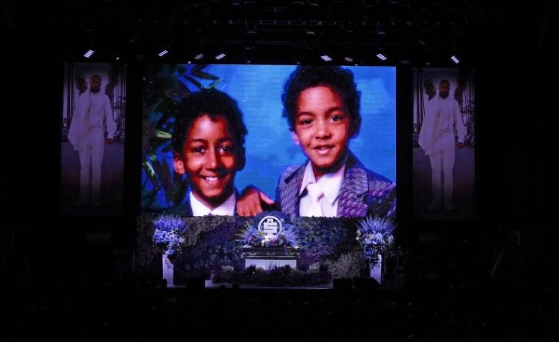 LOS ANGELES, CALIFORNIA - APRIL 11: (EDITORS NOTE: All images taken by Getty Images inside the Staples Center at Nipsey Hussle's Celebration of Life have been reviewed and approved for distribution by Atlantic Records) Photos are displayed during Nipsey Hussle's Celebration of Life at STAPLES Center on April 11, 2019 in Los Angeles, California. Nipsey Hussle was shot and killed in front of his store, The Marathon Clothing, on March 31, 2019 in Los Angeles. Kevork Djansezian/Getty Images For Atlantic Records/AFP